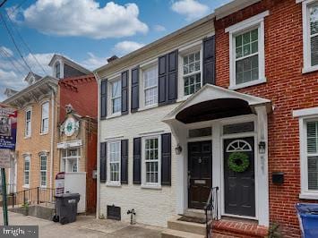 519 Locust St, Columbia, PA 17512 - view of front of home with entry steps and brick siding