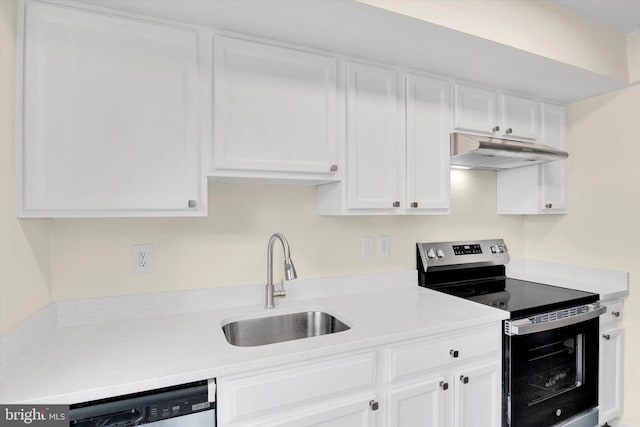 kitchen with white cabinetry, sink, and appliances with stainless steel finishes