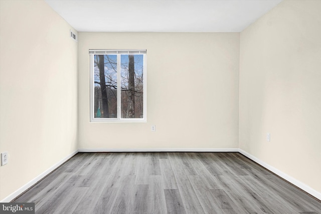 empty room featuring light hardwood / wood-style floors