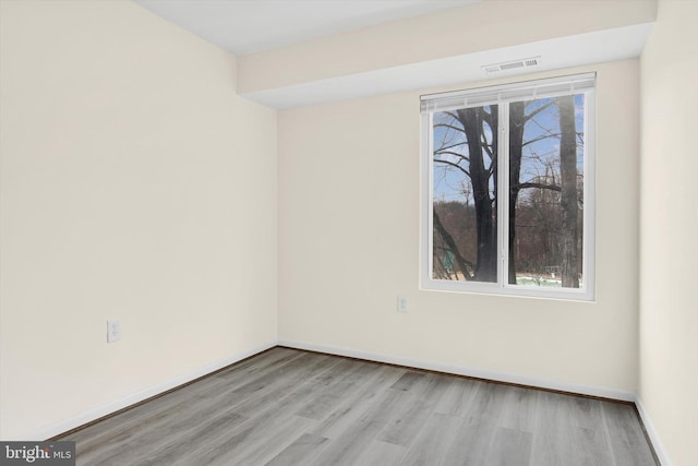 empty room with light wood-type flooring