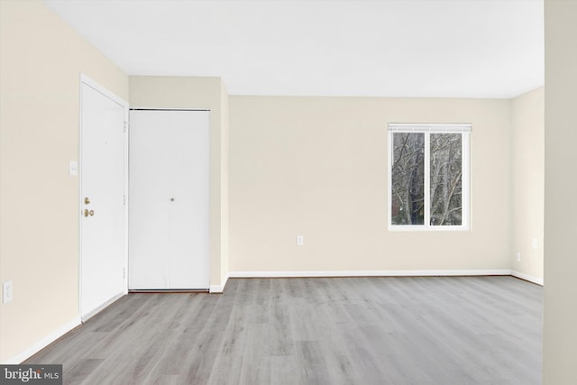 empty room featuring light hardwood / wood-style floors