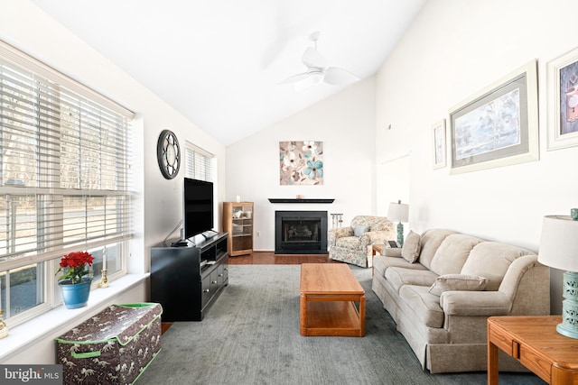 living room with vaulted ceiling, wood-type flooring, and ceiling fan