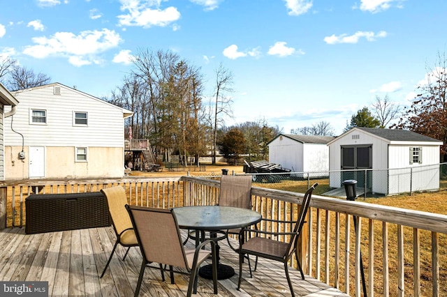 wooden deck with a shed