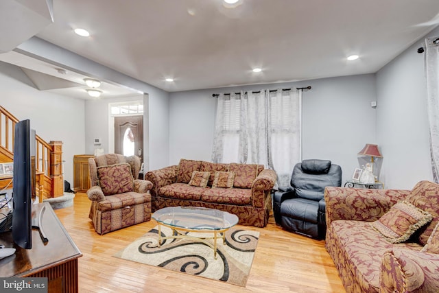 living room with light hardwood / wood-style floors