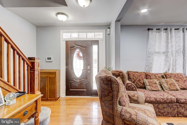 foyer entrance featuring light wood-type flooring