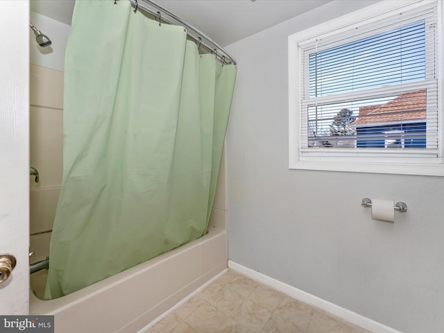 bathroom with shower / bath combo