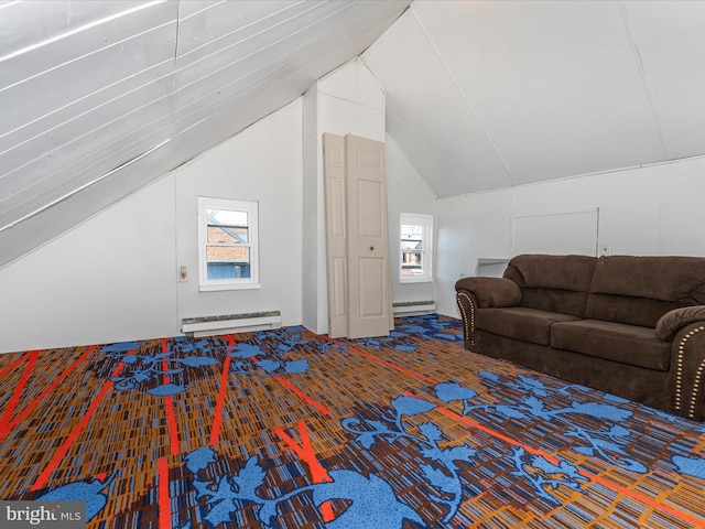 unfurnished bedroom featuring multiple windows, vaulted ceiling, and baseboard heating