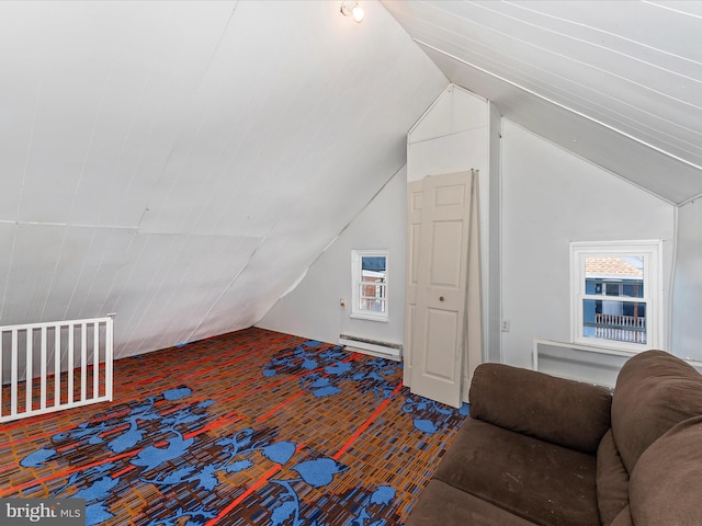 bonus room featuring lofted ceiling and a baseboard radiator