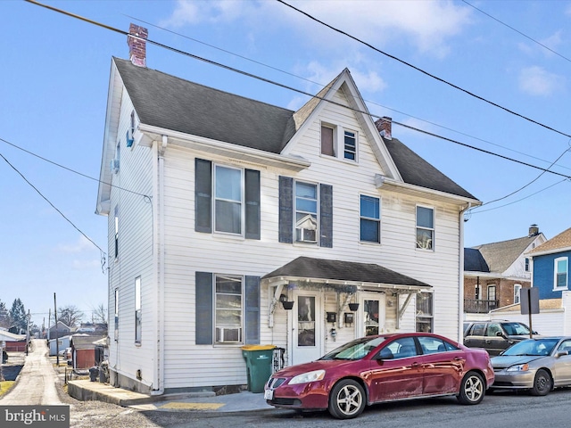 view of front of home featuring cooling unit