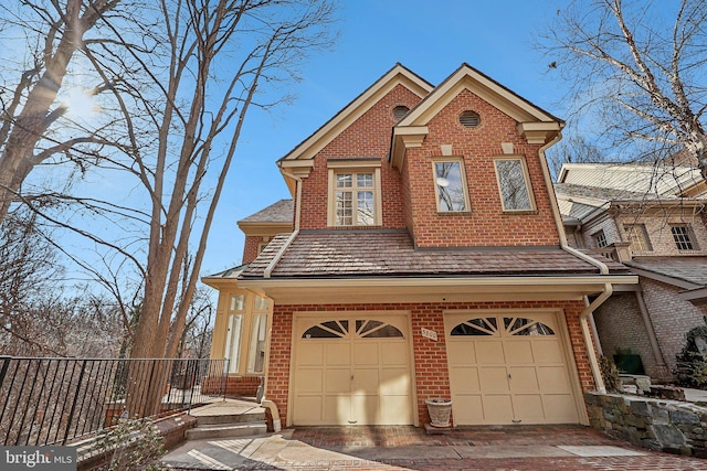 view of front of home featuring a garage