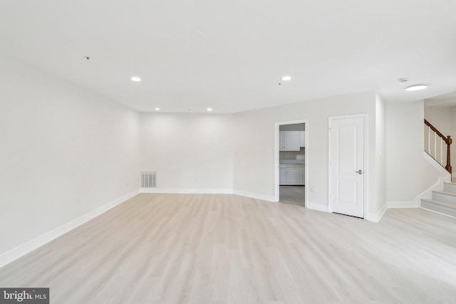 unfurnished room featuring light hardwood / wood-style flooring