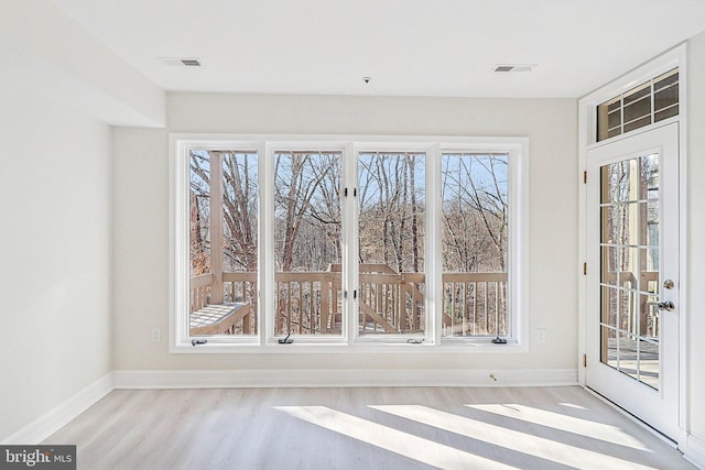 interior space with light hardwood / wood-style floors