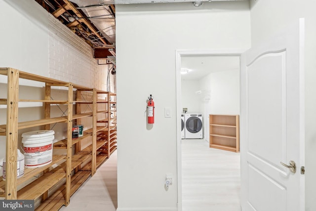 interior space with washing machine and clothes dryer