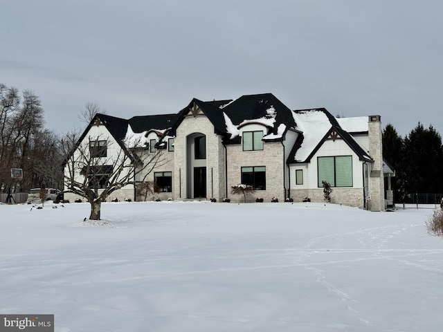 view of french country inspired facade