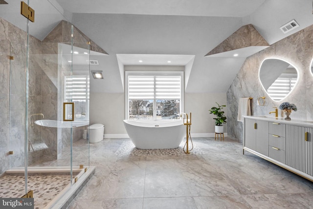 bathroom featuring lofted ceiling, independent shower and bath, and vanity