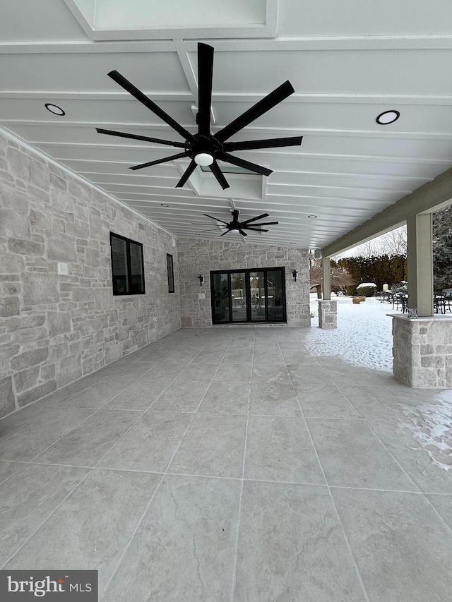 view of patio featuring ceiling fan