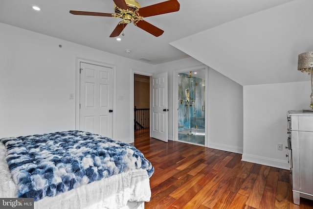 bedroom with lofted ceiling, ceiling fan, and dark hardwood / wood-style floors