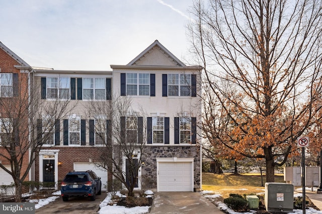 view of front of property with a garage