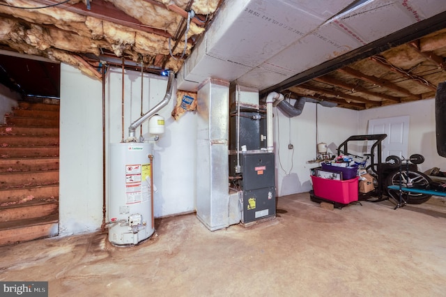 basement with water heater and heating unit