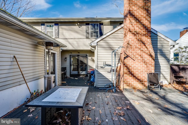 rear view of house with a deck