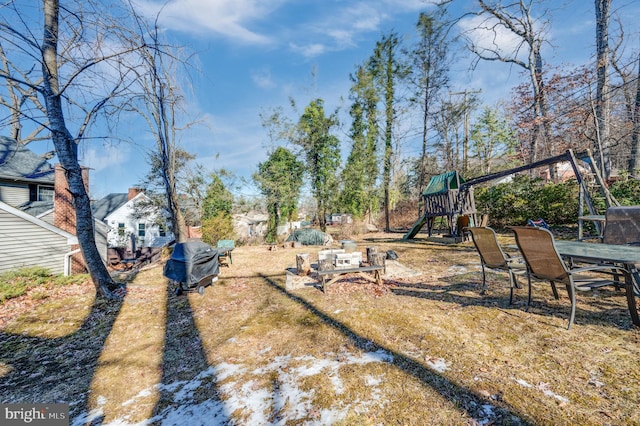 view of yard with a playground