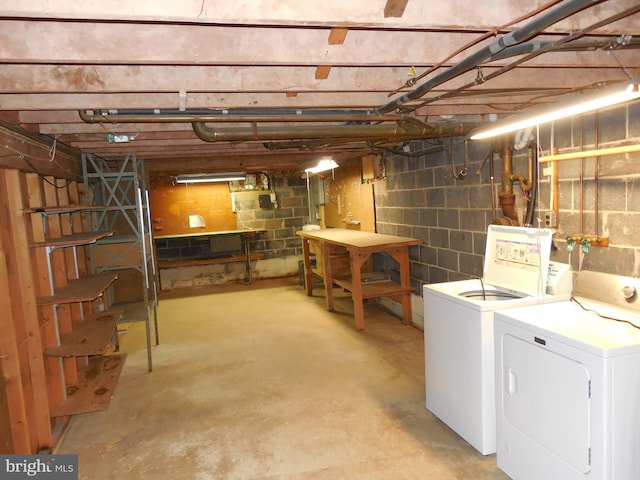 basement featuring separate washer and dryer