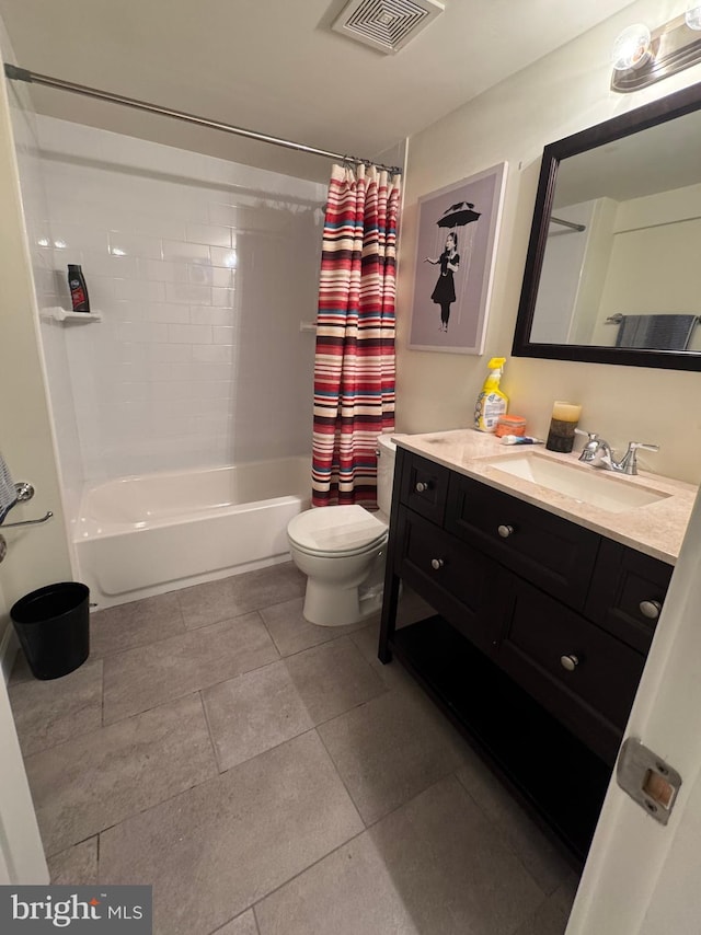 full bathroom with vanity, shower / tub combo, tile patterned floors, and toilet