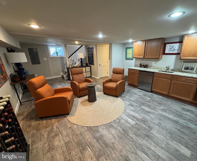 living room with wood-type flooring and wet bar