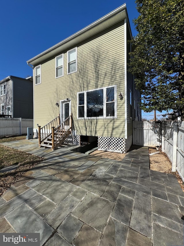 rear view of property with a patio