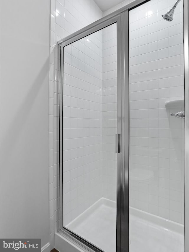 bathroom with an enclosed shower