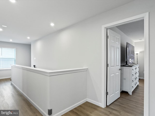 hall featuring wood-type flooring