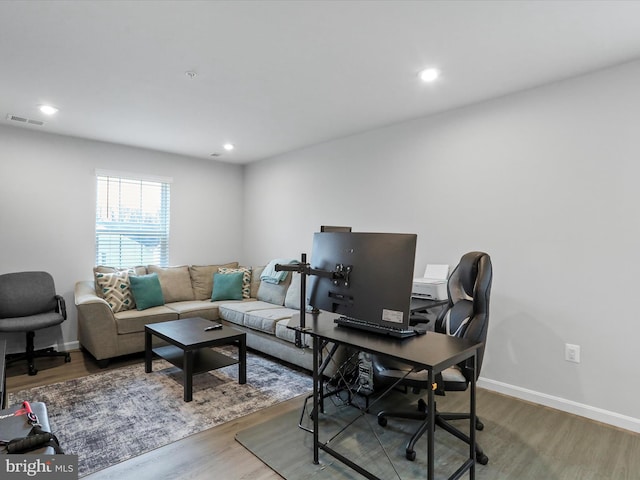 office area with hardwood / wood-style flooring