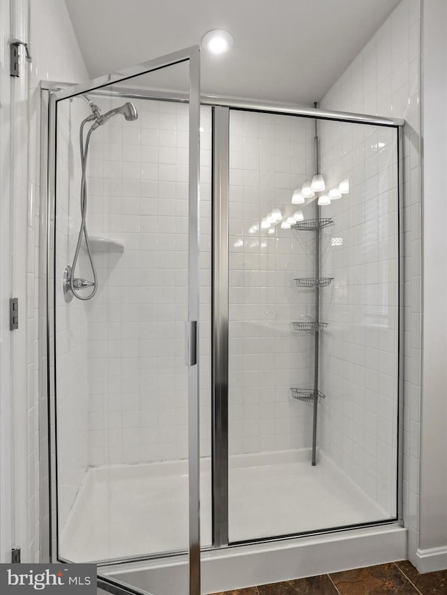 bathroom featuring walk in shower