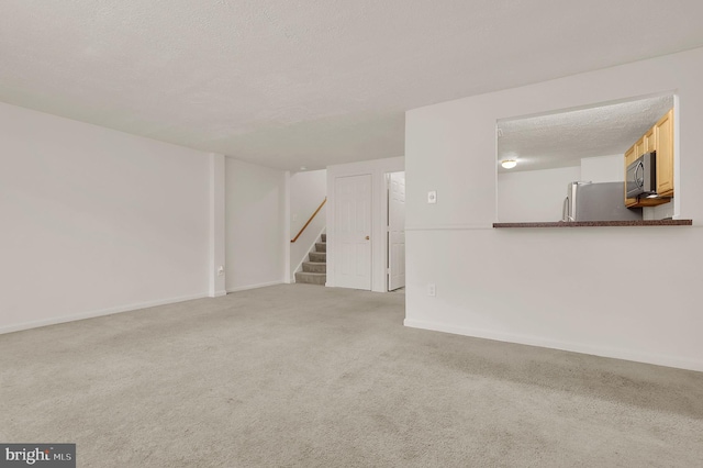 interior space featuring a textured ceiling