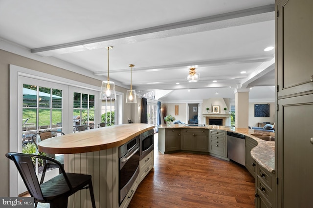 kitchen featuring gray cabinets, appliances with stainless steel finishes, dark hardwood / wood-style flooring, a kitchen bar, and beam ceiling