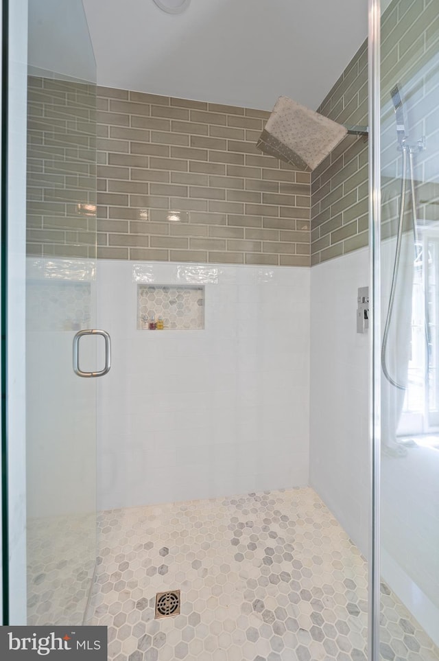 bathroom featuring walk in shower