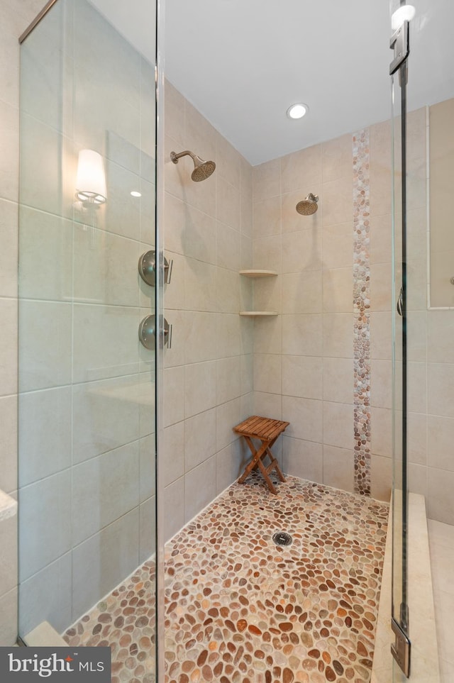 bathroom featuring walk in shower