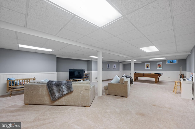 carpeted living room with pool table and a drop ceiling