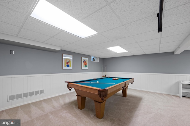 rec room with a drop ceiling and carpet floors