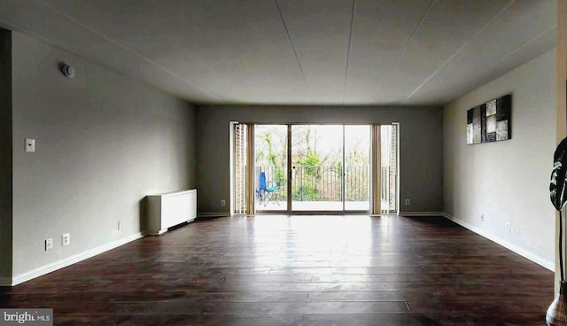 6011 Emerson St Unit 307, Bladensburg, MD 20710 - spare room featuring dark wood-type flooring