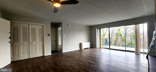 6011 Emerson St Unit 307, Bladensburg, MD 20710 - interior space featuring radiator heating unit, dark hardwood / wood-style flooring, access to outside, ceiling fan, and a closet