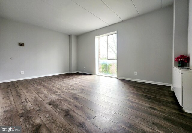 6011 Emerson St Unit 307, Bladensburg, MD 20710 - spare room featuring dark wood-type flooring