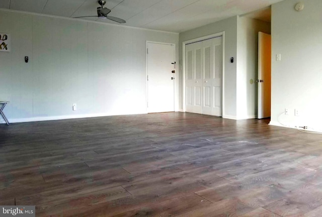 6011 Emerson St Unit 307, Bladensburg, MD 20710 - spare room featuring dark hardwood / wood-style flooring, ornamental molding, and ceiling fan