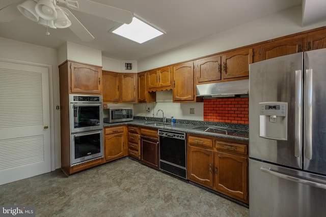 kitchen with sink, ceiling fan, and black appliances