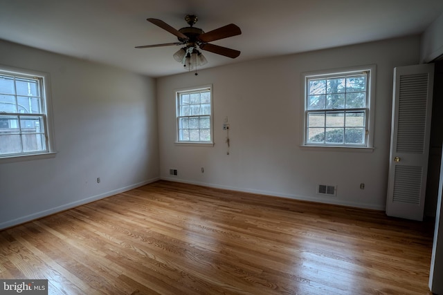 unfurnished bedroom with ceiling fan and light hardwood / wood-style floors