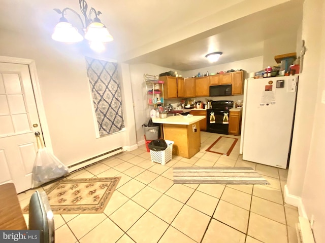 kitchen with pendant lighting, light tile patterned floors, baseboard heating, a center island, and black appliances