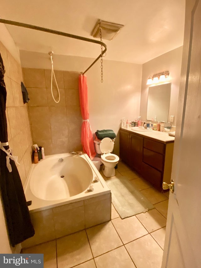 full bathroom with vanity, shower / tub combo with curtain, tile patterned floors, and toilet