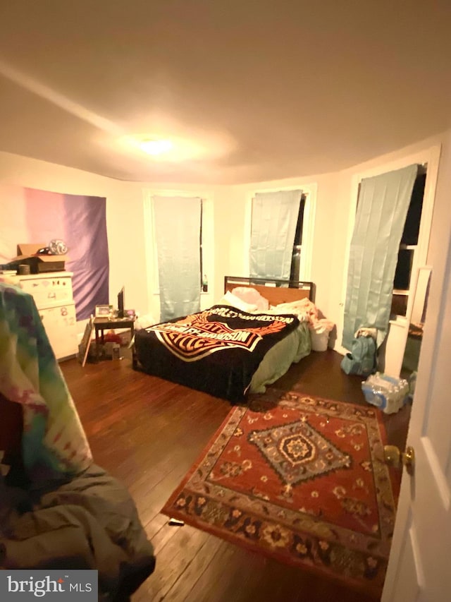 bedroom featuring hardwood / wood-style floors