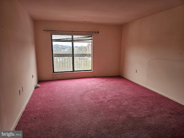 view of carpeted spare room