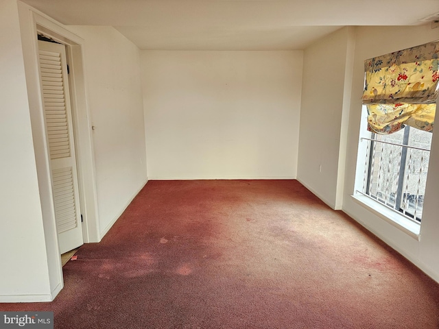 empty room with carpet floors